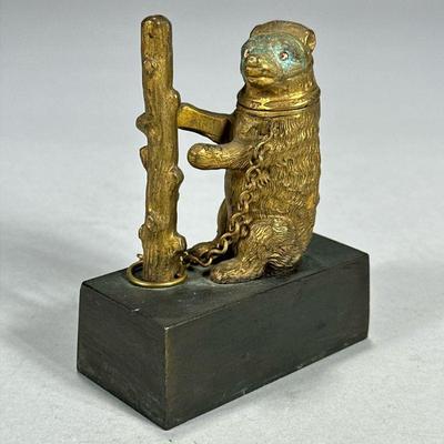 BRASS BEAR MATCHSTICK HOLDER | Bronze bear with flip top head revealing match holder. - l. 3 x w. 1.5 x h. 4 in

