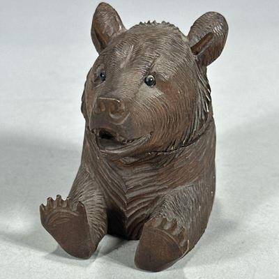 CARVED WOOD BEAR INKWELL | Carved wood bear head & lower body with flip top to reveal inkwell. - l. 3 x w. 2.25 x h. 3.5 in

