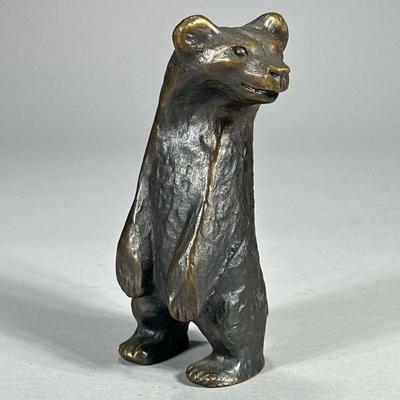 SMALL BRASS BEAR SCULPTURE | Brass standing brass bear figurine, artist signed on back. - l. 3 x w. 2.5 x h. 6.25 in

