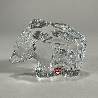 Orrefors Glass Bear | Orrefors Sweden crystal glass bear figure with red label and etched signature to underside. - l. 5.25 x h. 4 in

