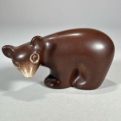 HOWARD PIERCE PORCELAIN BEAR FIGURINE | Glazed porcelain bear figurine by Howard Pierce, marked on bottom. - l. 6.5 x w. 3 x h. 3.5 in

