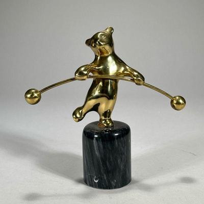 Brass Circus Bear | Standing bear with long barbell on a black stone base, heavy! No apparent markings. - l. 8.25 x h. 8 in

