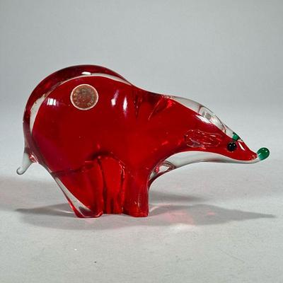 Murano Glass Bear | Red murano glass bear figure with green nose and eyes, with Murano, Italy label. - l. 7 x h. 4.25 in

