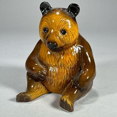 CERAMIC BEAR COIN BANK | Glazed ceramic bear coin back, malted on bottom “Made in England” Dimensions: l. 5.5 x w. 5 x h. 6.25 in

