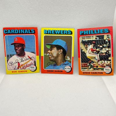 1975 Topps #150: Bob Gibson, St. Louis Cardinals.
1975 Topps #660: Hank Aaron, Milwaukee Brewers
1975 Topps #185: Steve Carlton,...
