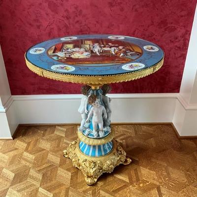 LOT 917 Sevres Style Gilt Mounted Putti Base Porcelain Accent Center Table