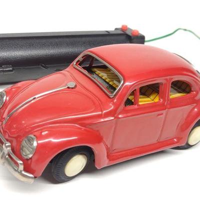 Japan Volkswagen Beetle Battery Op Tin Toy Car