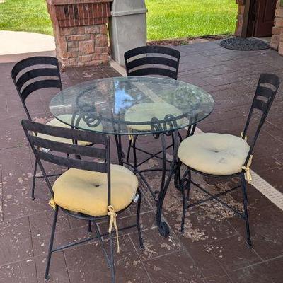 Glass & wrought iron table and chairs set