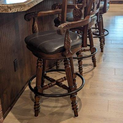 Ashley North Shore swivel bar stools