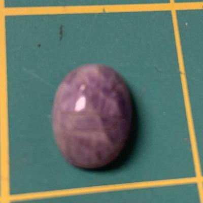 https://www.agesagoestatesales.com/product/hei8034-vintage-hickok-cabochon-carved-amethyst-stone/1062

