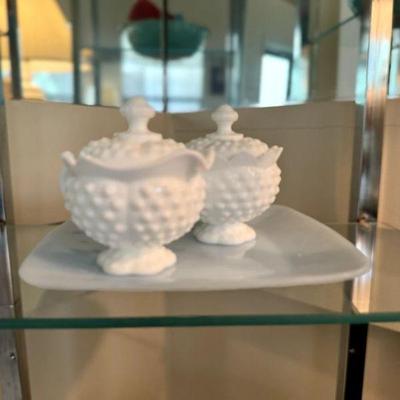 Fenton Hobnail Milk Glass Candy Dishes on a 4 shelf Contemporary Chrome and Glass Etagere.