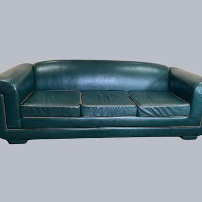 Streamlined Green Faux Leather Sofa With Beige Contrast Piping
