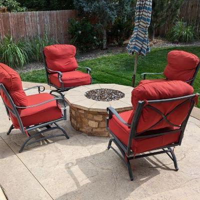 Metal patio chairs and umbrella