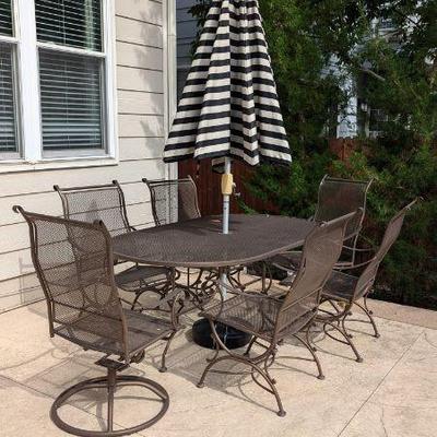 Patio table, chairs and umbrella