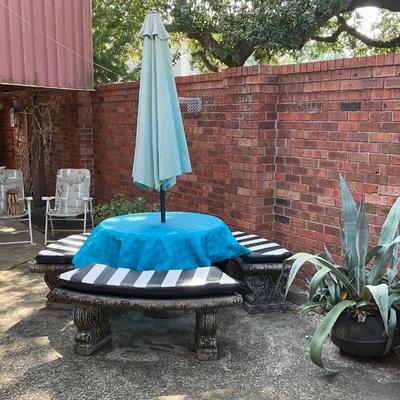 Round concrete table with benches    
PULLED BY THE ESTATE