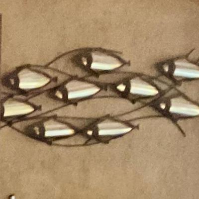 Brass school of fish sculpture