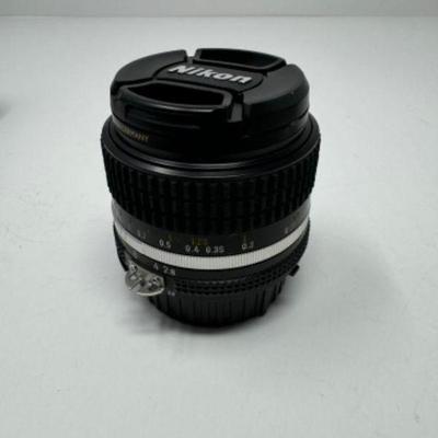 Nikon Nikkor 28mm 1:2.8 904960 +  XS Pro Digital B&W Filter | Est $550+	