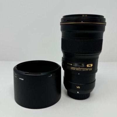 NIKON AF-S Nikkor 300mm Nano Crystal Coat & B+W UV Lens | Est. $2,050	