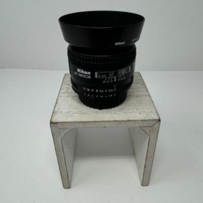 Nikon AF Nikkor 35mm 1:2D + Nikon HN-3 | Est. $390	