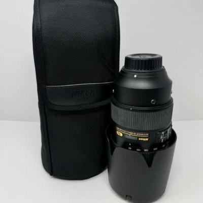 Nikon AF-S Nikkor 80-400mm + B&W 77 010 UV + Nikon HB - 65 | Est. 2,390	