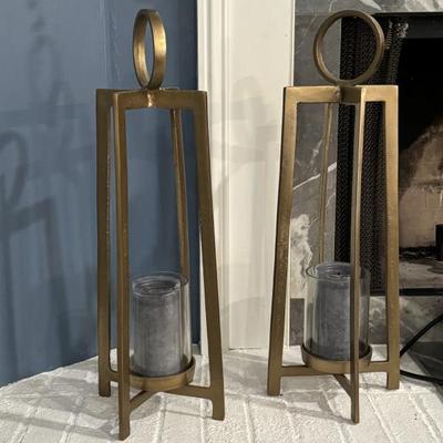 Large contemporary candle holders 28” tall. 