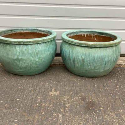 DEJE600 Large Enamel & Clay Pots	This lot includes two large(H12.5xW20) and gorgeous rustic teal pots, each have two drain holes. 
