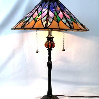 LIGR210 Vintage Quozoil Tiffany Style Lamp	Lamp shade glass is in very good shape. Metal plate below finial has a dent.

