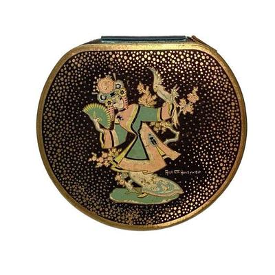 KIHE704 1950’s Annette Honeywell Compact	Zipper enclosure, loose powder, compact, signed. Gold tone with lovely female dancer. One image...