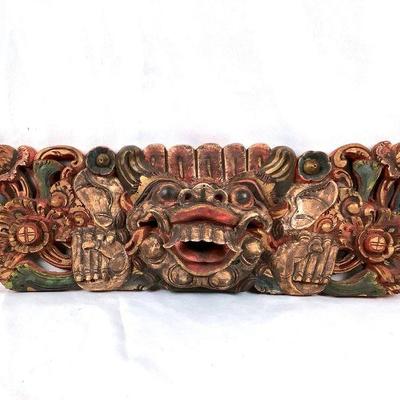 CT228 Hand Carved Sun Teak Panel	Early 20th century hand carved, hand painted wall plaque. It features a Balinese Barong mask style...