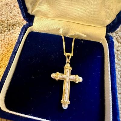 18kt gold cross on 14 kt gold chain
