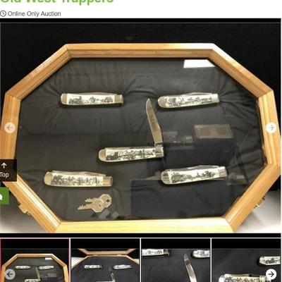 Lot # : 251 - Display Case Karst Scrimshaw Old West Trappers
All 5 Knives are Case xx 5 dot USA 6254 Scrimshaw by Designer/Artist Linda...