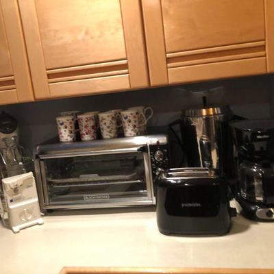 Small Appliances  (Cuisinart Food Processor, Sunbeam Mixer, Black and Decker Toaster Oven, Percolator. Toaster, Coffee Maker).