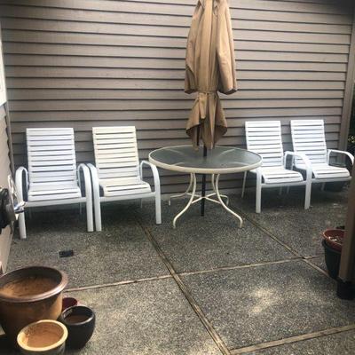 Umbrella Table, 4 Patio Chairs, Planters.