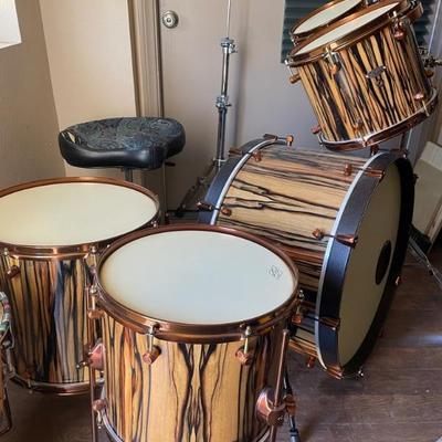 MICHIGAN ASH WOOD WITH COPPER & BRASS ACCENTS! LEATHER TRIM, THIS DRUM SET IS GORGEOUS!
