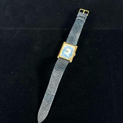 BILL BLASS STYLE STAMP WATCH | Benjamin Franklin 1 cent postage stamp watch in the style of Bill Blass with lizard skin band.

