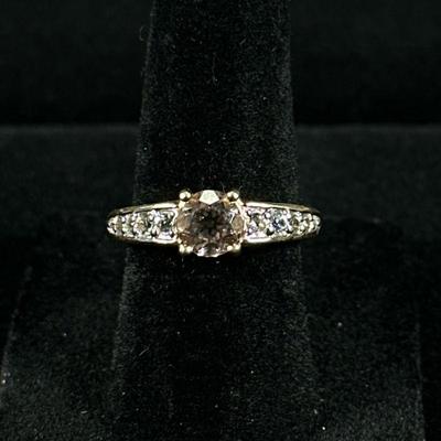 DIAMOND SIMULANT & STERLING RING | Designed as a sterling silver ring with large diamond simulant with graduating simulants, size 6,...