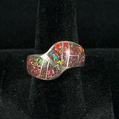 OPAL & STERLING RING | Designed as a sterling silver ring with inlaid geometric cut opal, size 6, total weight: 5.5g

