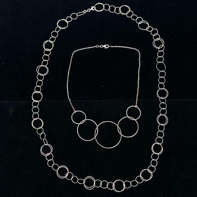 (2pc) STERLING SILVER CIRCULAR NECKLACES | Designed as a sterling silver interlinking hammered circle necklace marked on clasp...