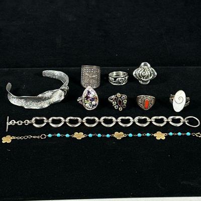 (10pc) STERLING SILVER JEWELRY | Including heart linked bracelet (15.1g), curved open bracelet (14g), flower form & bead bracelet...