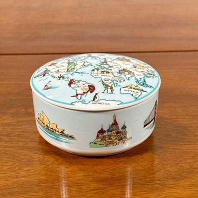TIFFANY & CO. LIDDED BOWL | Having world map on lid with famous sites on side. - h. 2.5 x dia. 4 in

