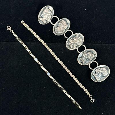 (3pc) STERLING SILVER BRACELETS | Designed as a 5-piece sterling silver medallion bracelet marked on back "HAGLUND / STERLING SILVER...