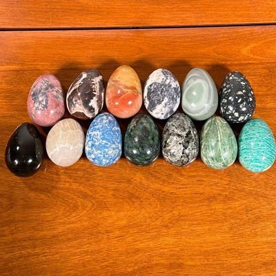 (13pc) STONE CARVED EGGS | Russian Ural Mountain stone carved eggs. - l. 2.5 x w. 1.5 in

