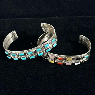 (2pc) NAVAJO STERLING & TURQUOISE BRACELETS | Designed as a sterling silver bracelet with parallel rows of turquoise and other...