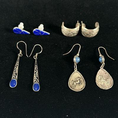 (4pc) STERLING SILVER EARRINGS | Designed as a pair of sterling silver curved earrings marked on back "Sterling", pair of...