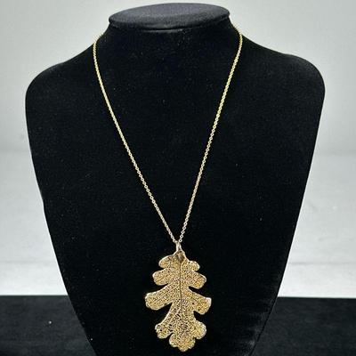 MIXED METAL LEAF PENDANT WITH 12K GOLD CHAIN | Designed as a mixed metal leaf pendant on 12K gold chain, chain marked “12K”, chain...