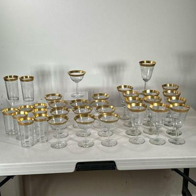 (33pc) GOLD RIM GLASSWARE | Including 9 water glasses, 12 wine glasses, and 12 water goblets. - h. 6.75 x dia. 3.5 in

