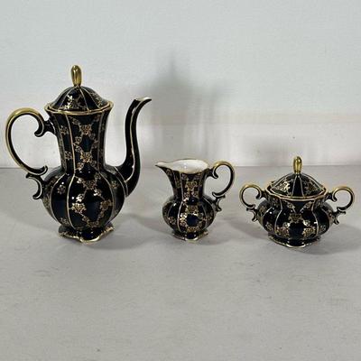 (3pc) LINDNER TEA SET | Lindner Echt Cobalt tea set including teapot, creamer, and sugar bowl.9 - l. 6 x w. 4 x h. 8 in (teapot)

