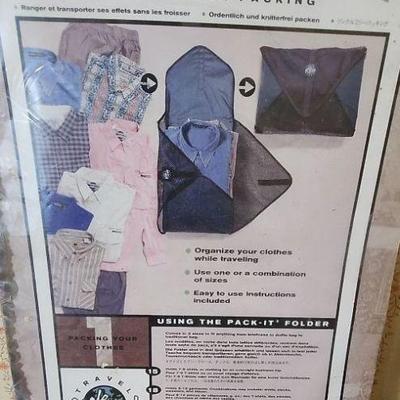 TTT135 - Metal Clothes Rack (Assembly Required) and Pack It Folder for Clothing
