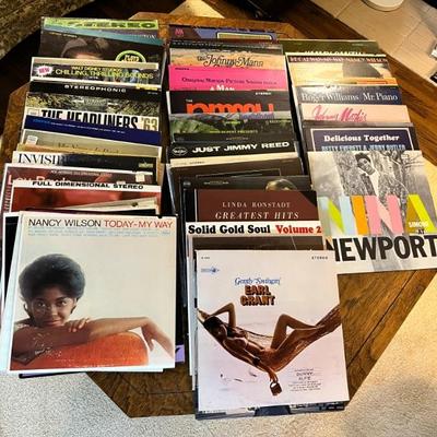 Many vintage vinyl records in their original sleeves, in great condition! 
