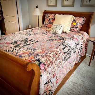 Queen-size sleigh bed with hidden cedar drawer